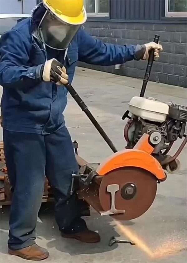 the chop saw machine cuts railway tracks with abrasive cut off wheel